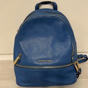 Blue leather Micheal Kors backpack purse